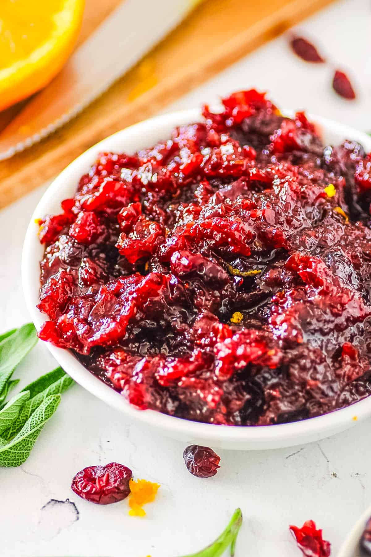 Cranberry sauce made from dried cranberries in a small white serving dish.