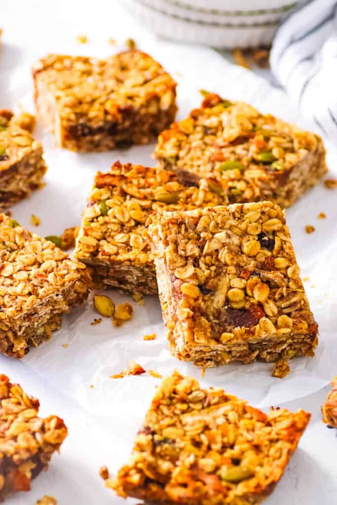 Healthy flapjack bars on sheet of parchment paper.