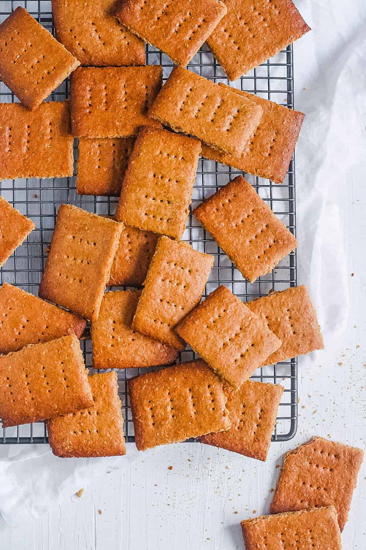 Vegan graham crackers on a wire rack.