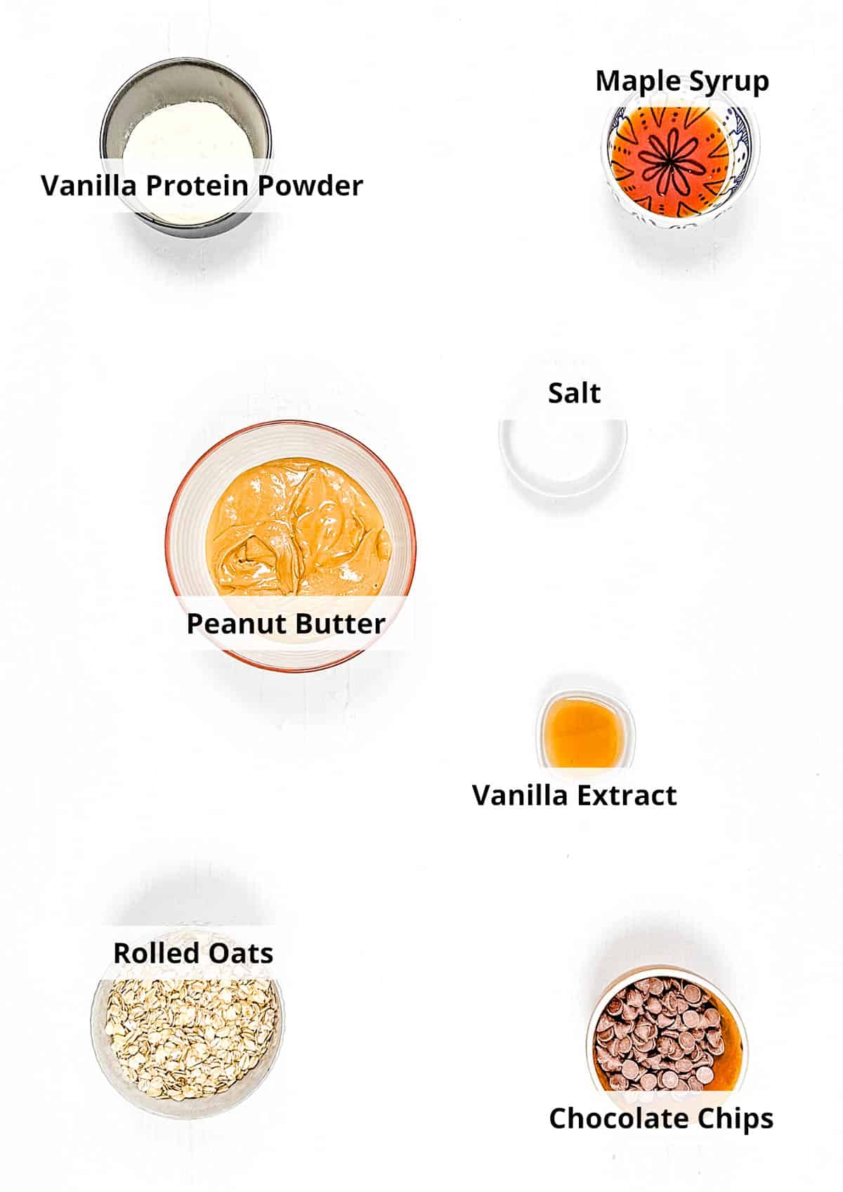 Ingredients for healthy vegan protein balls recipe on a white background.