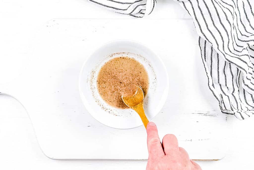 Ground flaxseeds and water mixed in a mixing bowl.