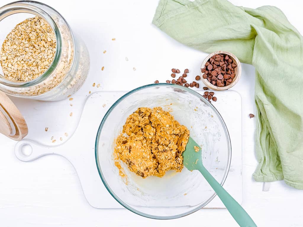 Protein energy bites dough combined in a mixing bowl.