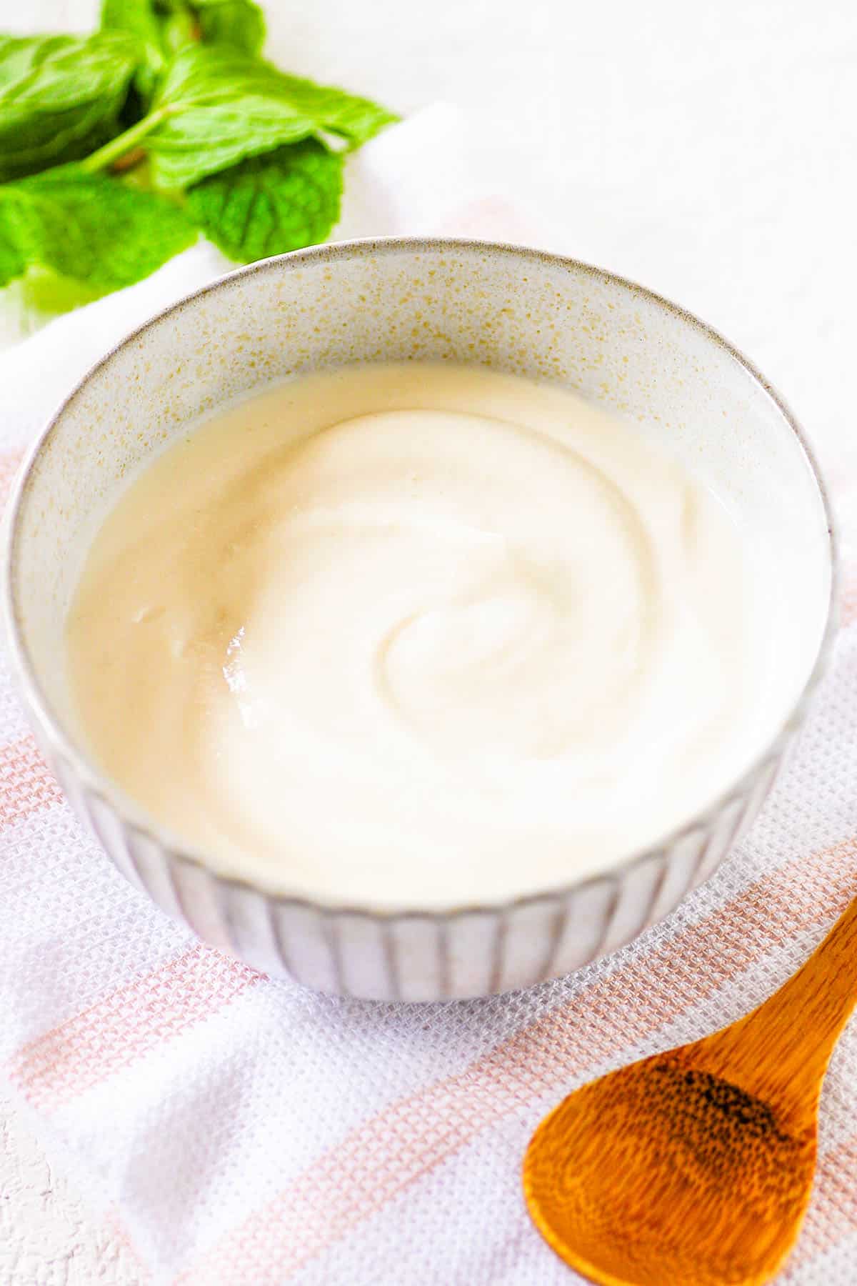 Healthy creamed cottage cheese served in a white bowl.