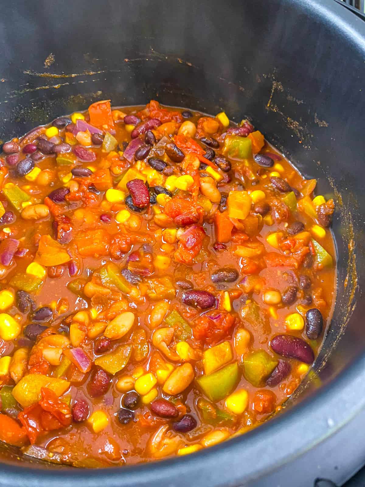 Vegetarian chili cooking in the Instant Pot.