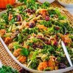 Roasted pumpkin quinoa salad on a white serving platter.