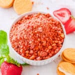 Homemade strawberry crunch topping served in a white bowl.