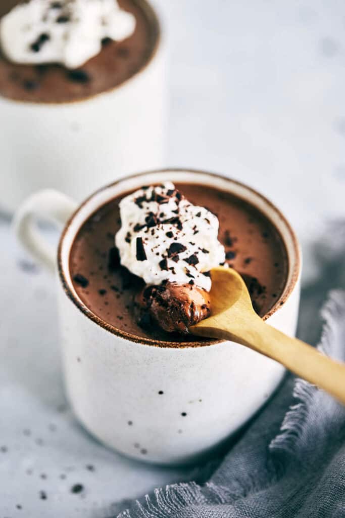 Chocolate chai pot de creme on in a white mug.