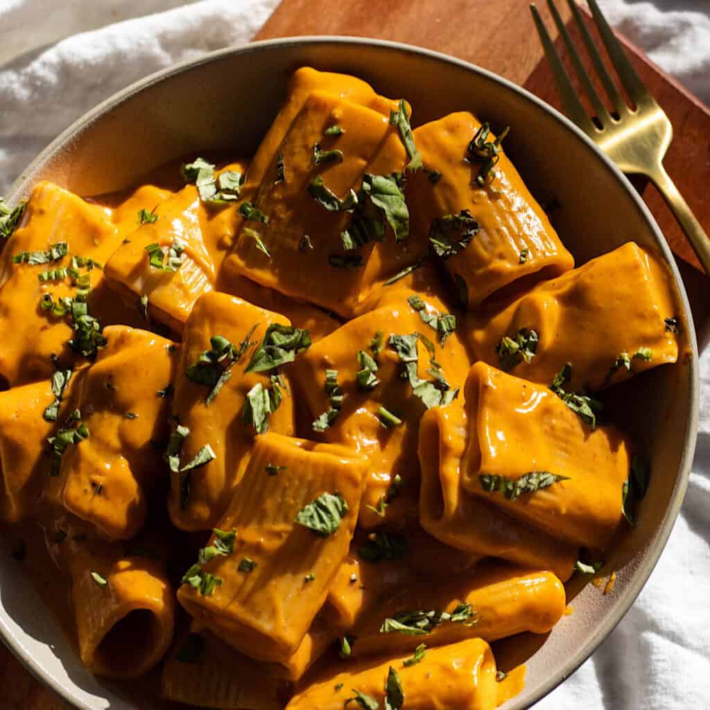 Vegan sweet potato pasta in a serving bowl.