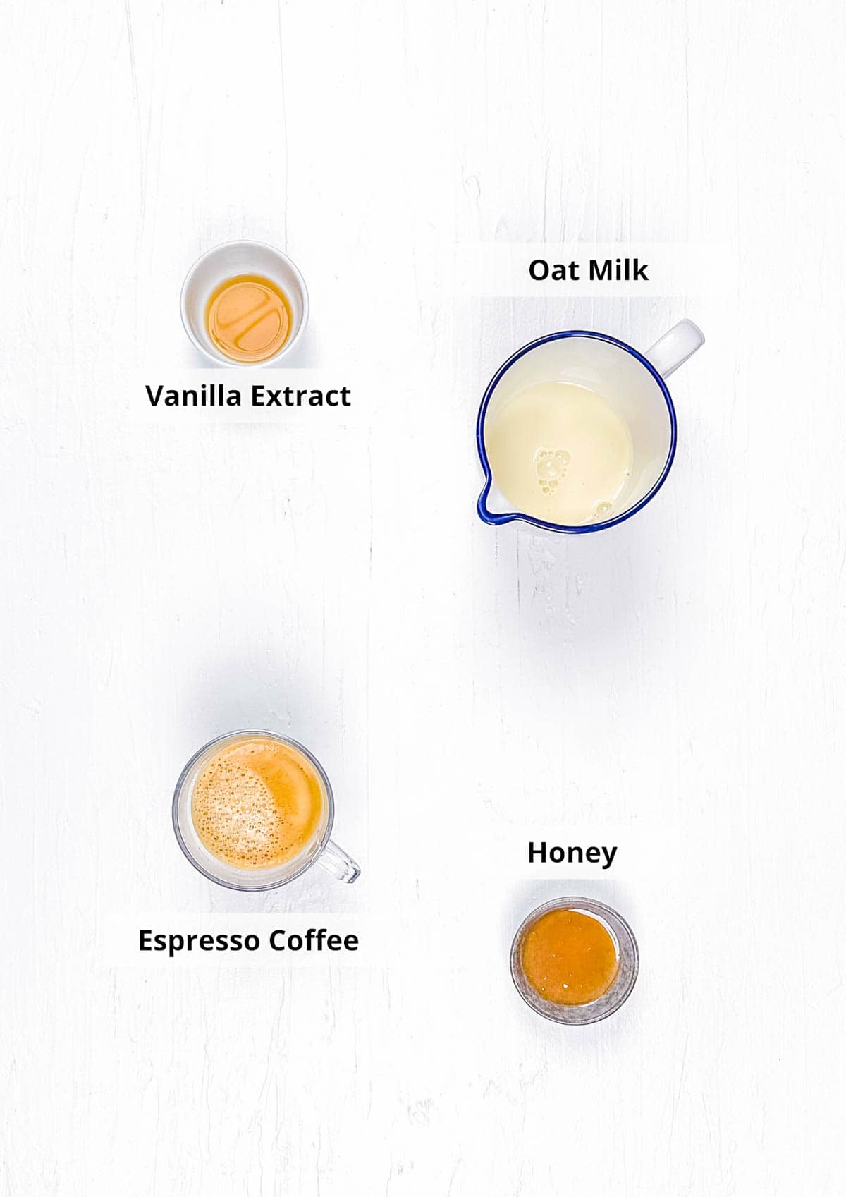 Ingredients for easy honey latte recipe on a white background.