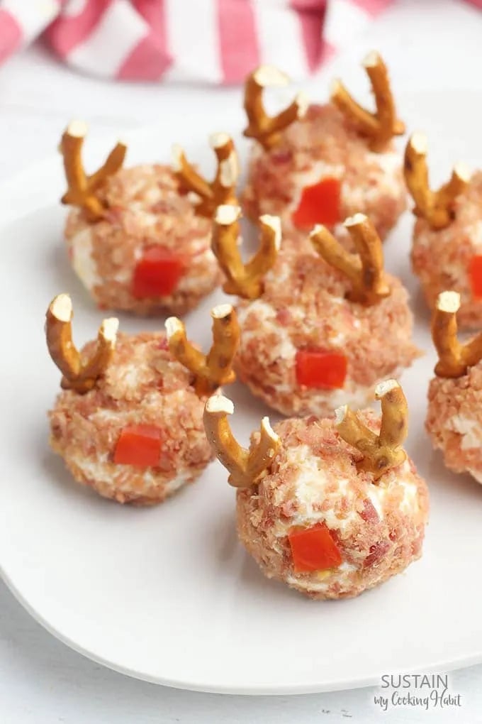 Reindeer cheese balls appetizer on a white plate.