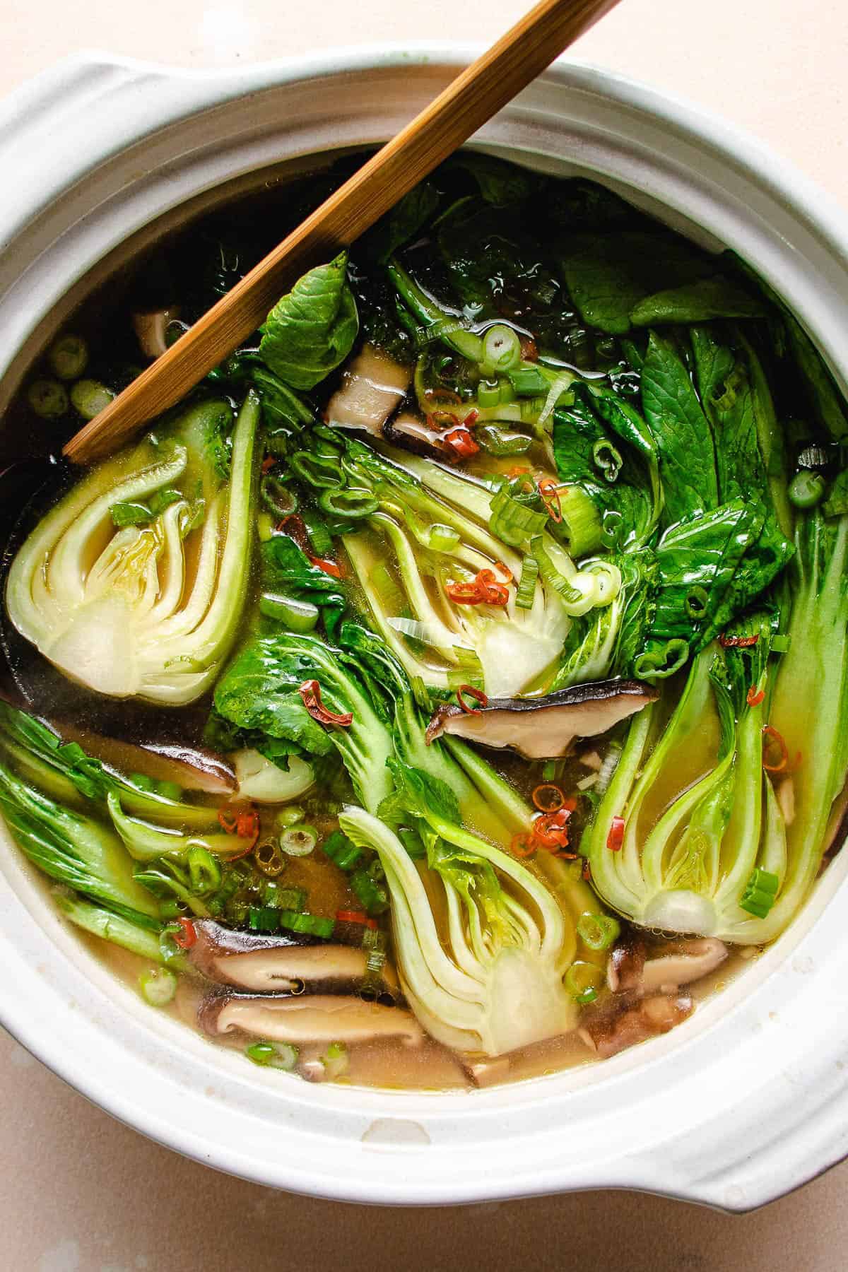 Overhead shot of a bowl of vegan bok choy soup.