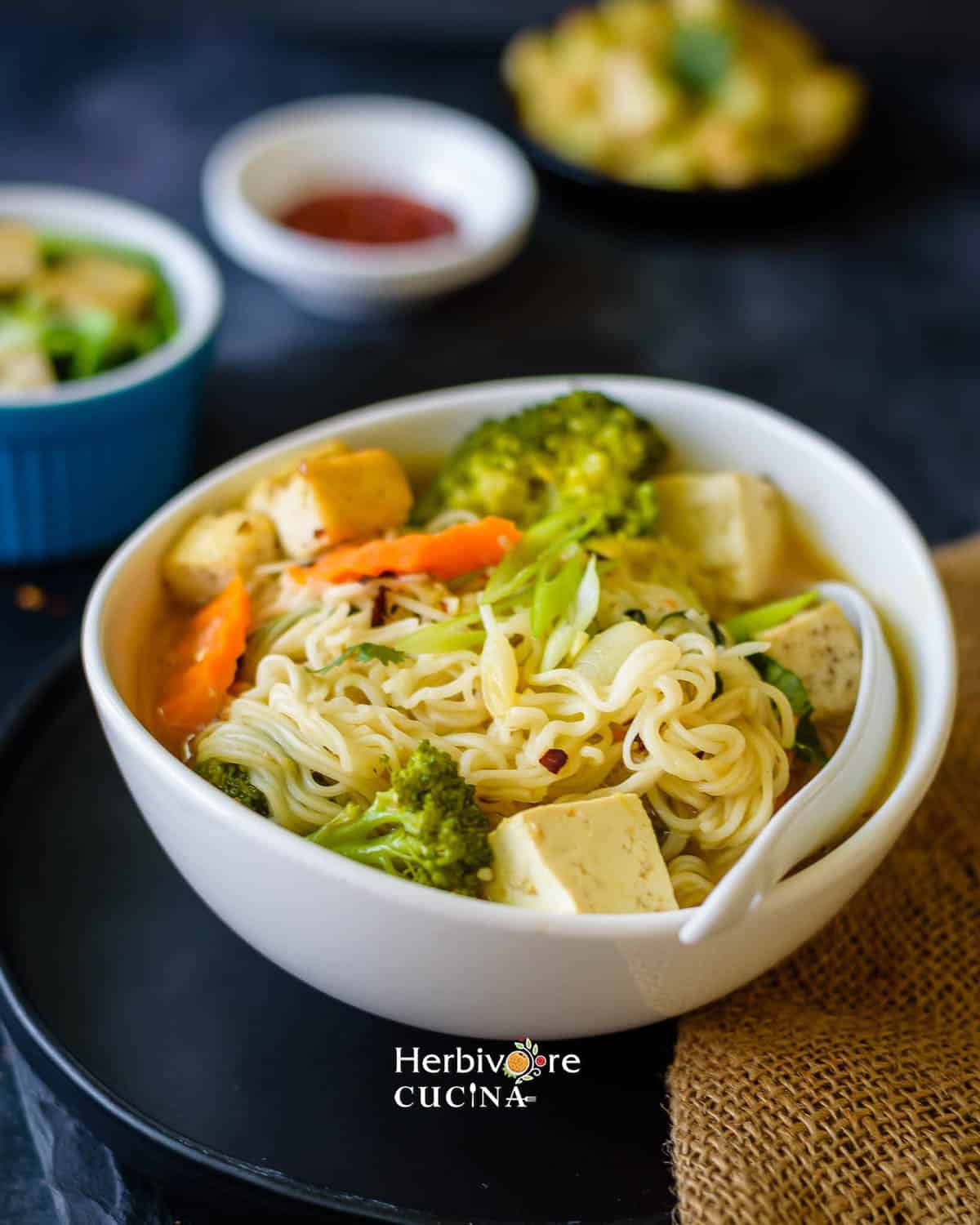 A sie shot of a bowl of Instant Pot Ramen with vegetables.