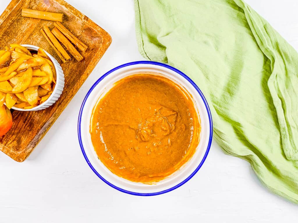 Pumpkin pie filling in a mixing bowl.