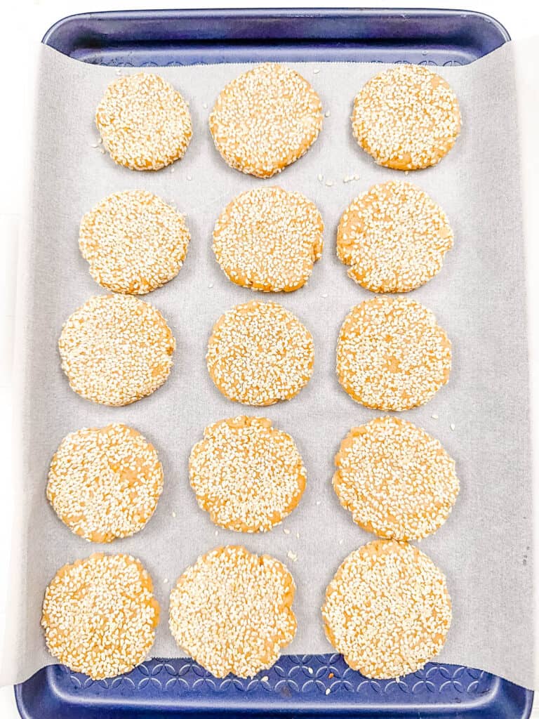 Tahini sesame cookies on a baking sheet.
