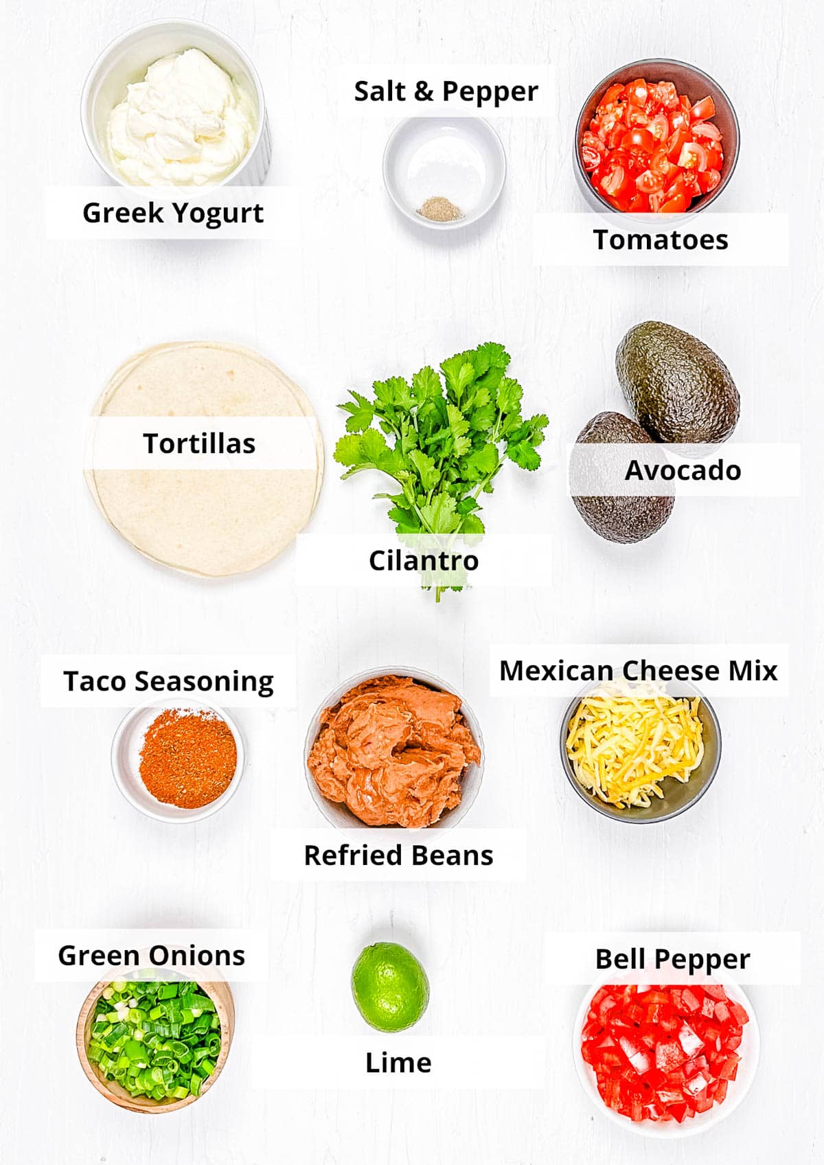 Ingredients for easy 7 layer taco dip recipe on a white background.
