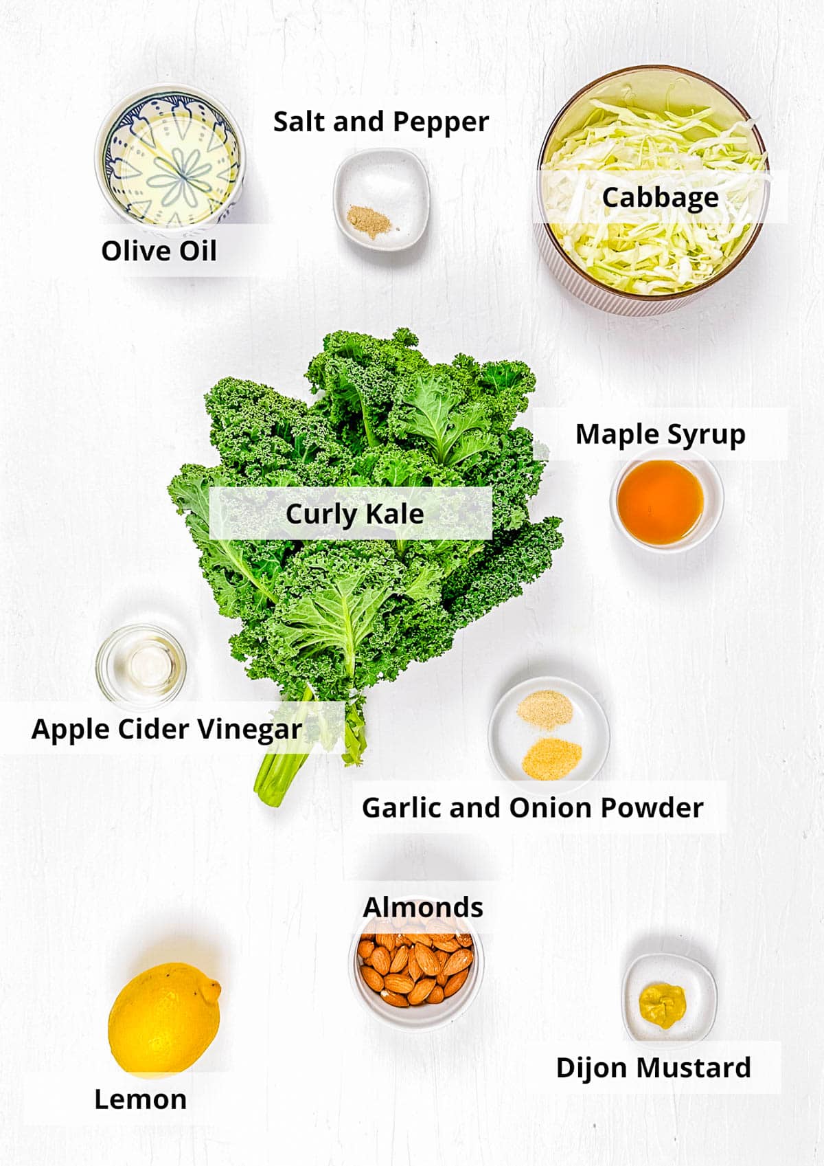 Ingredients for copycat Chick-Fil-A kale salad recipe on a white background.