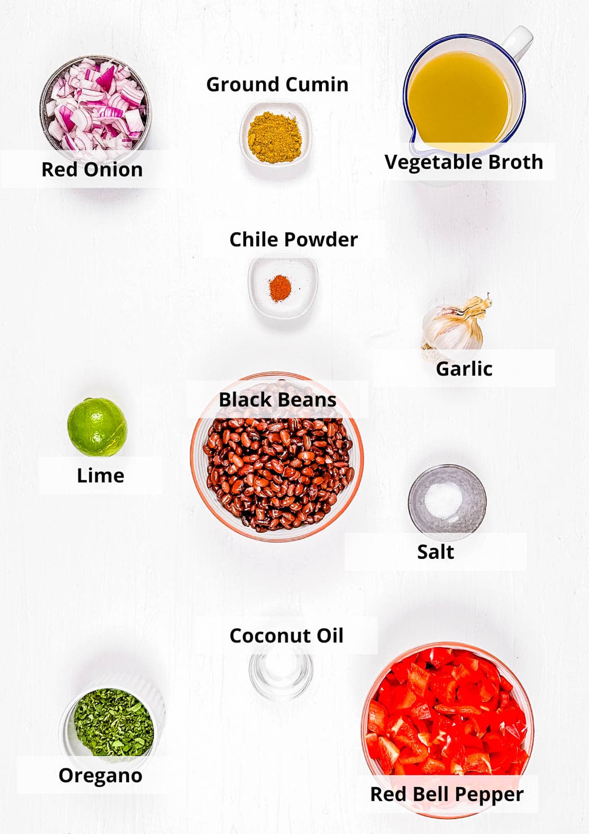Ingredients for vegan black bean soup recipe on a white background.