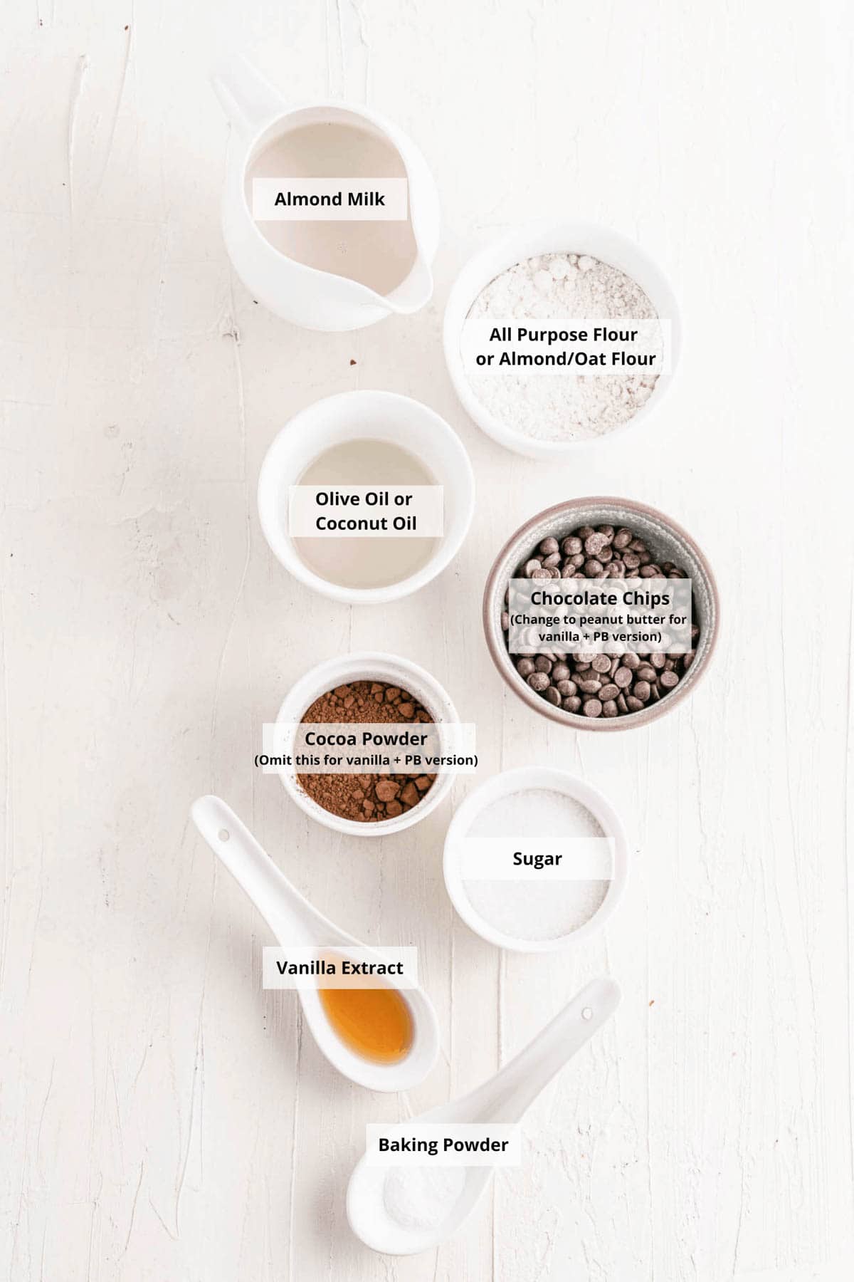 Ingredients for easy vegan mug cake recipe on a white background.