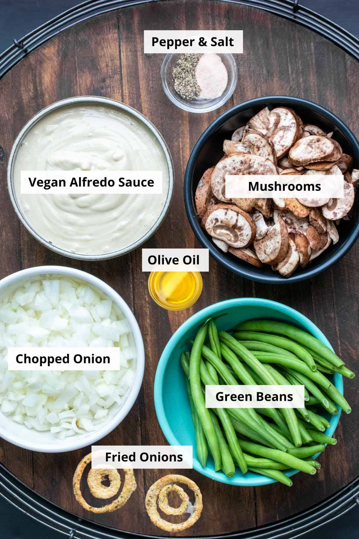 Bowls filled with ingredients for green bean casserole