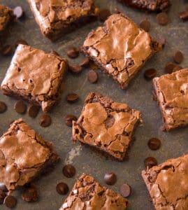 Low sugar desserts: Black bean brownies on a black cutting board.