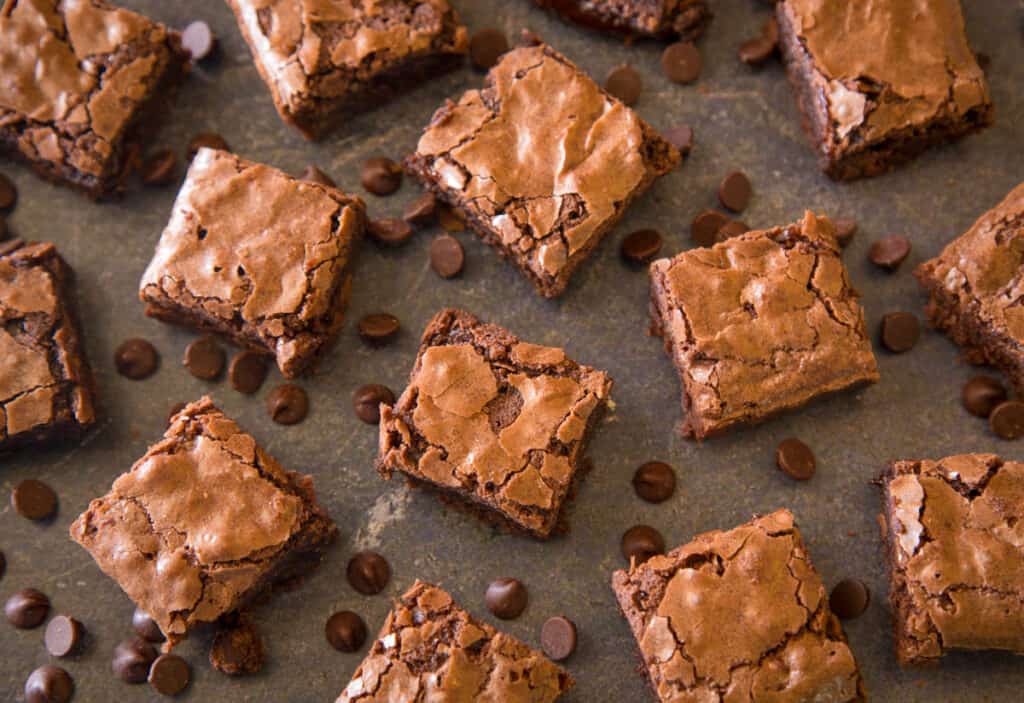 Low sugar desserts: Black bean brownies on a black cutting board.