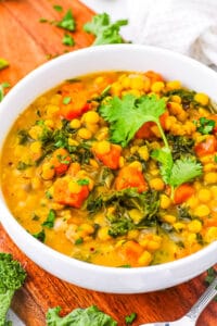 Easy sweet potato dahl served in a bowl, garnished with cilantro.