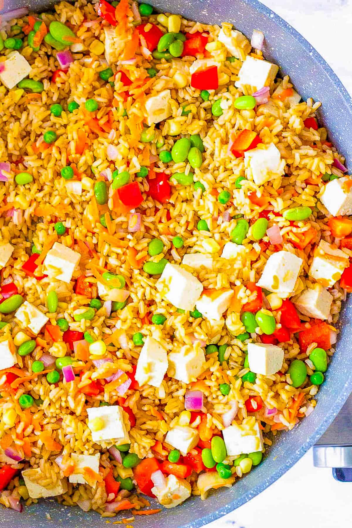 Tofu fried rice served in a large pan.