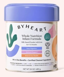 Can of ByHeart Whole Nutrition Infant Formula on a pink background.