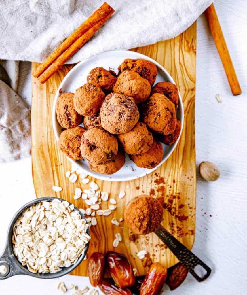 Easy peanut butter date balls, served on a white plate.
