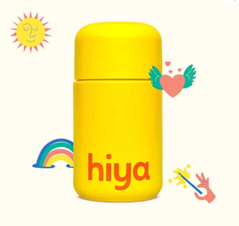 Bottle of Hiya kids vitamins on a yellow background.