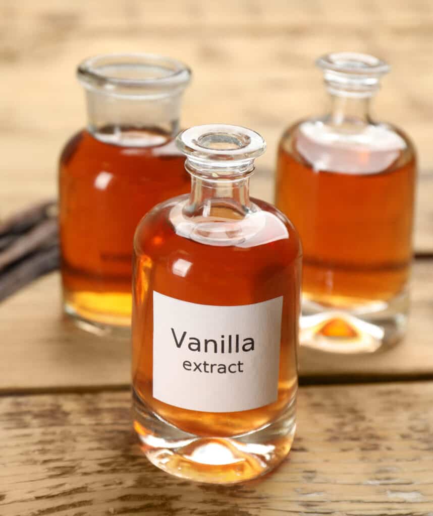 Homemade vanilla extract in glass jars.