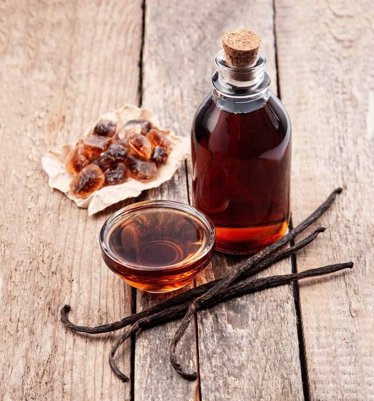 How to make vanilla extract at home - homemade vanilla extract stored in a glass jar.