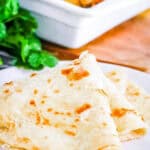 Authentic Guyanese roti served on a white plate.