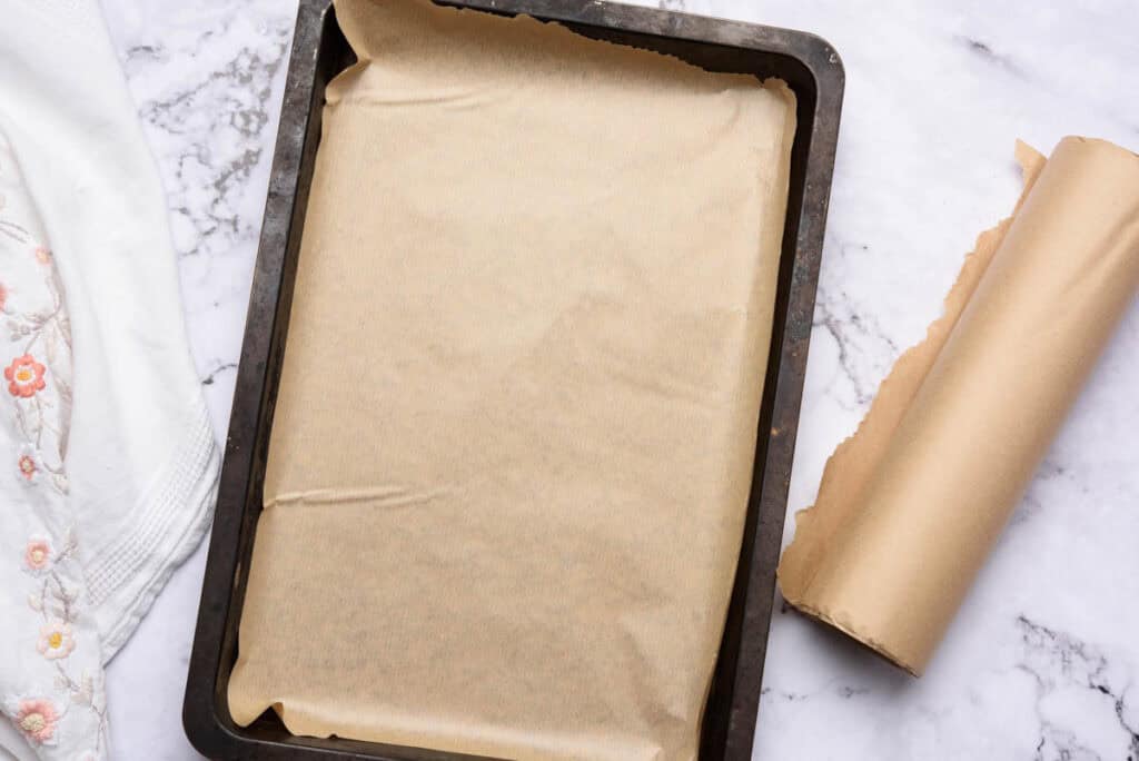 Baking sheet lined with parchment paper.