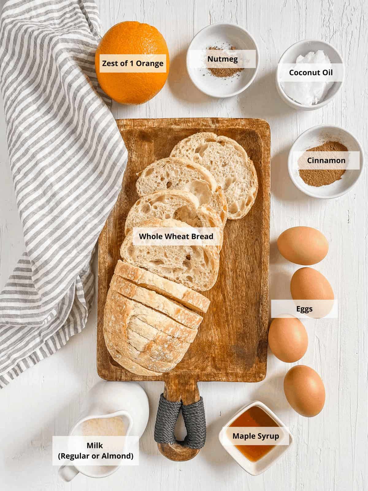 Ingredients for healthy french toast recipe on a white background.