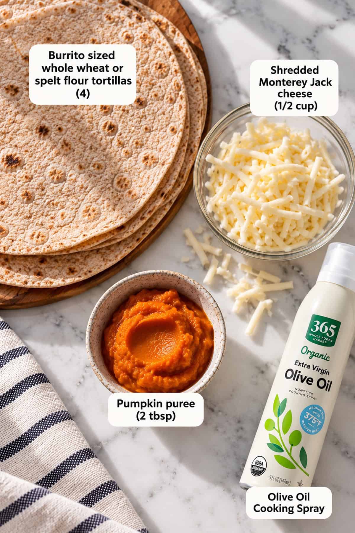 Ingredients for Halloween Jack-o-lantern quesadillas on a white countertop.